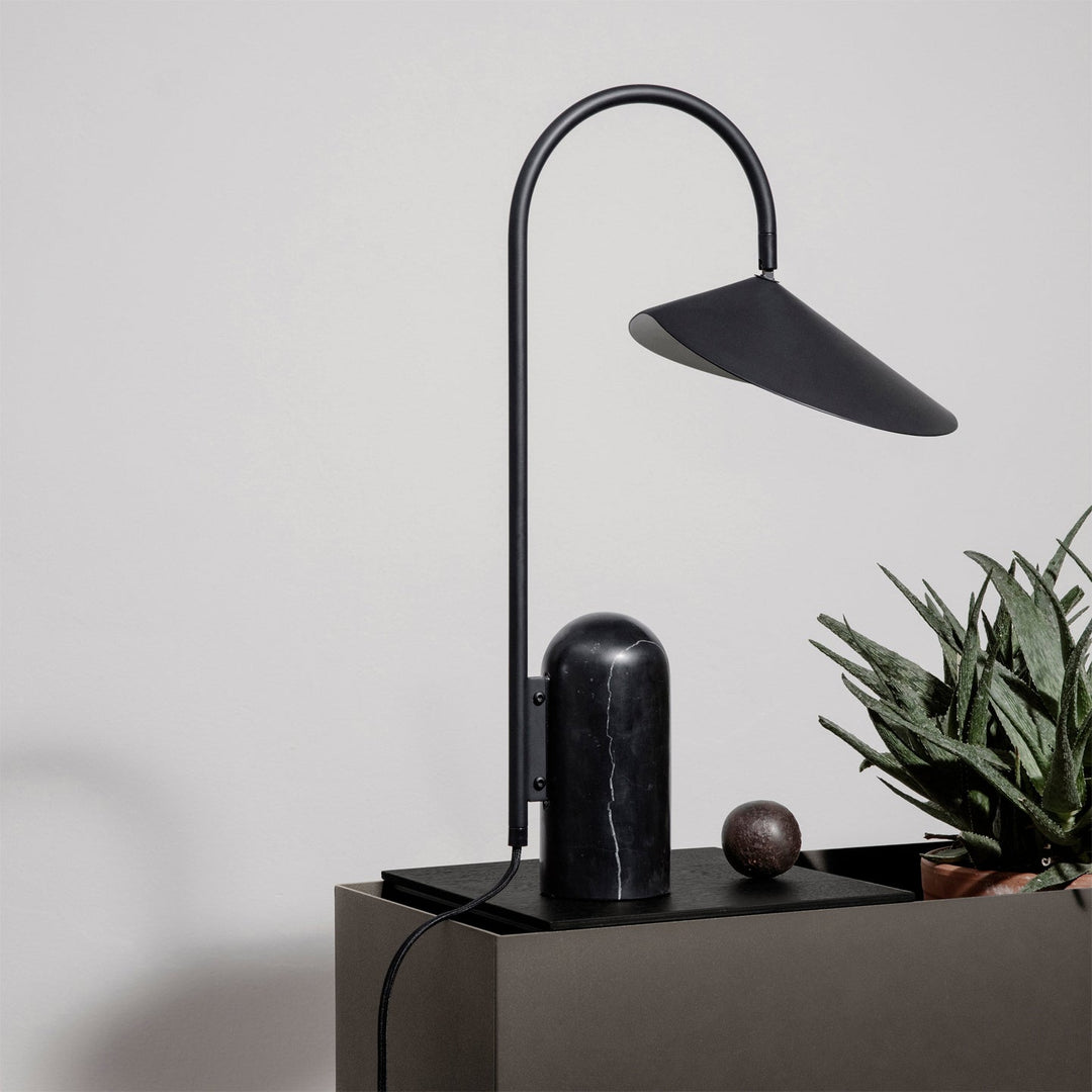 Elegant Reyaris arch design lamp, minimalist style, perfect for bedrooms.