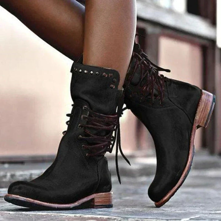 Durable women's lace-up ankle boots, ideal rugged footwear for fall, winter, and casual stylish outfits.