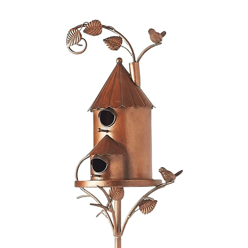 Rustic metal birdhouse with a beautiful copper finish and double entry, perfect for garden decor.