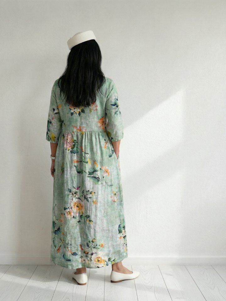 Women's soft hold floral midi dress in sage green, long sleeve with a relaxed fit, ideal as a casual everyday dress.