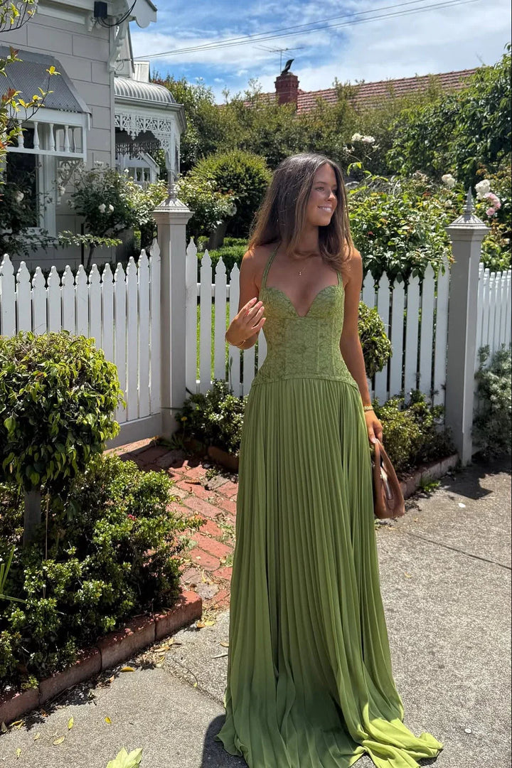 Women's sleeveless sage green maxi dress with pleated skirt & corset bodice, perfect for parties.