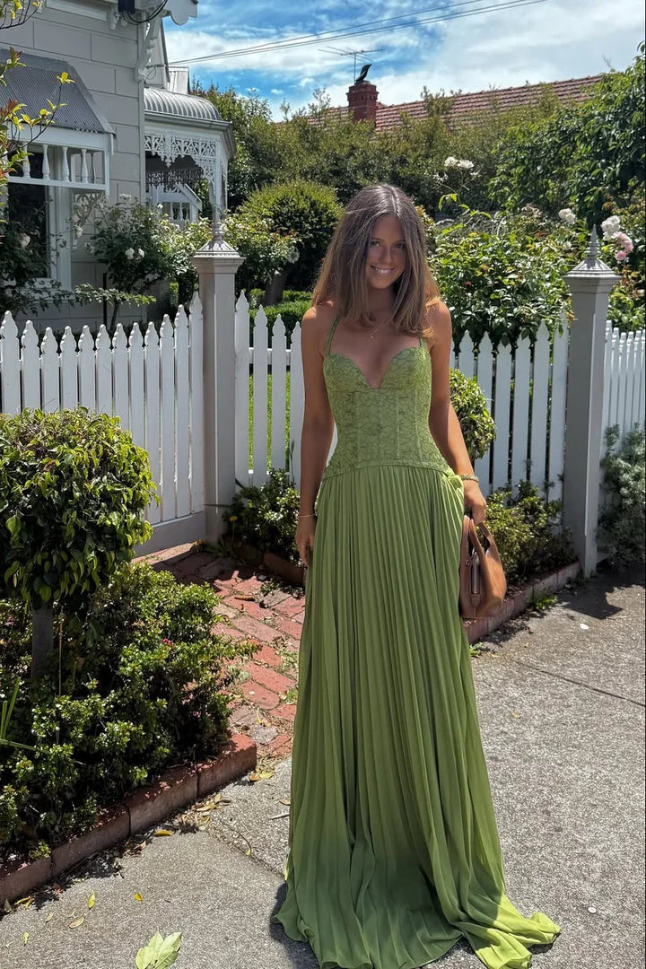 Beautiful sage green pleated maxi dress for women, features a stylish corset top. Ideal for summer parties.