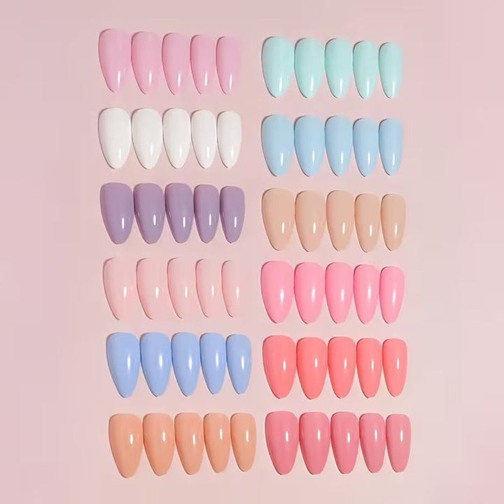 Unisex salon-quality nail art tip kit with false nails, glue, and accessories for professional DIY manicures.