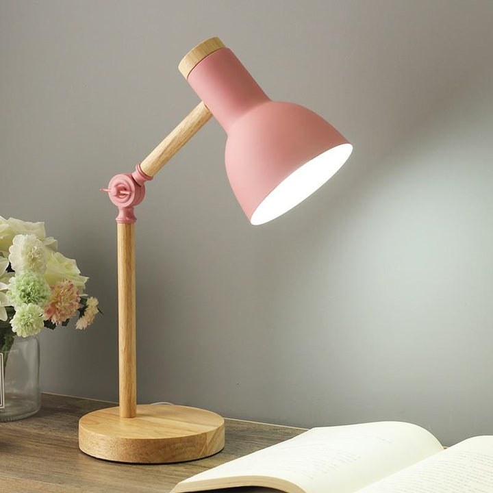 Adjustable wooden desk lamp, foldable design. Scandinavian modern lighting for a productive office or cozy bedroom.