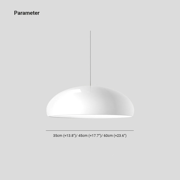 Modern sculptural LED pendant light illuminating a dining room with warm, adjustable ambiance.