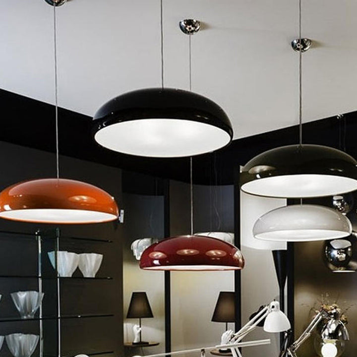 Unique angle of the sculptural metal LED pendant light, highlighting its artistic, modern form.