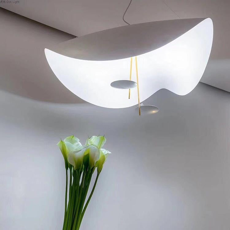 White artistic leaf design ceiling light, a sculptural focus for bright modern spaces.
