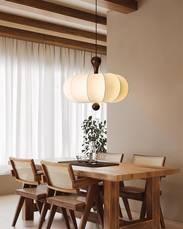 View from below: Sculptural walnut & white fabric pendant light. Modern ceiling fixture.
