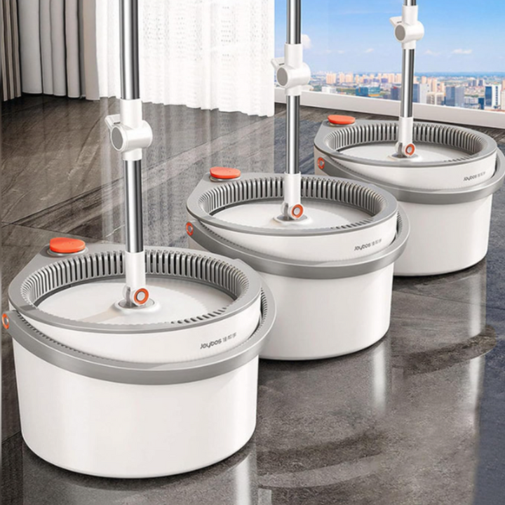 Self-wringing spin mop with super absorbent microfiber head for easy & deep home floor cleaning. Durable design.