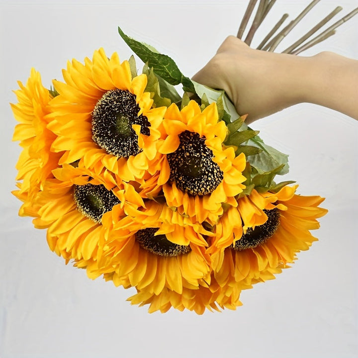 Vibrant yellow artificial sunflowers (11-piece set) for stunning home, wedding, or event decoration.