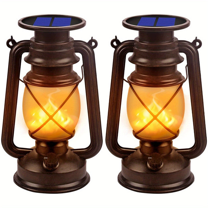 Pair of solar LED flame lanterns for garden & patio. Vintage style, energy-efficient, weather-resistant outdoor light.
