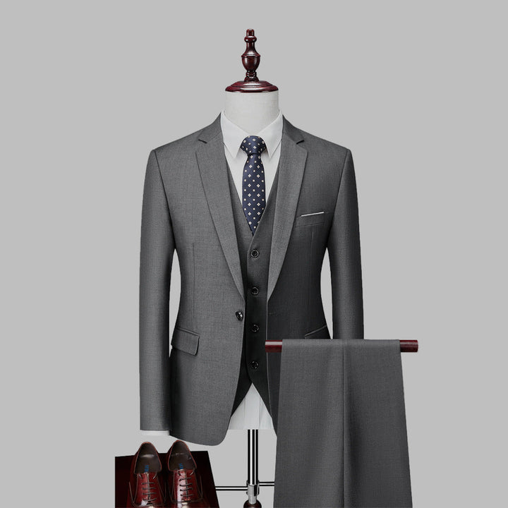 Sophisticated men's three-piece fashion suit, offering an elegant slim fit for formal events & executive wear.