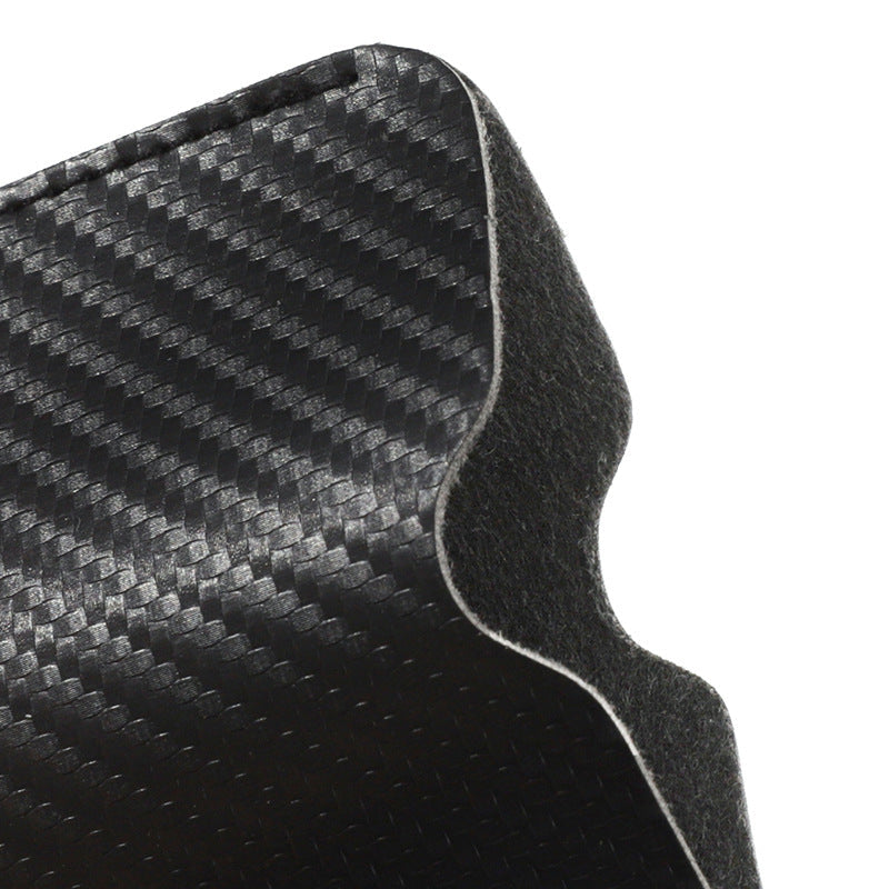 Sleek black carbon fiber card holder, a minimalist slim wallet for men, perfect for everyday carry and travel.