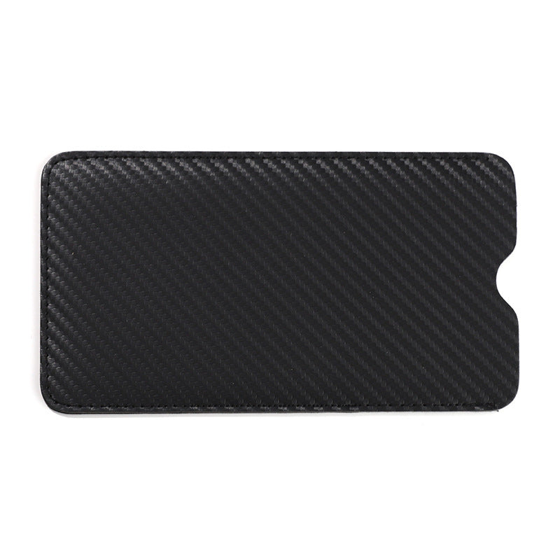 Modern men's carbon fiber minimalist wallet. Ultra-slim card holder in black, ideal for sleek style and EDC.