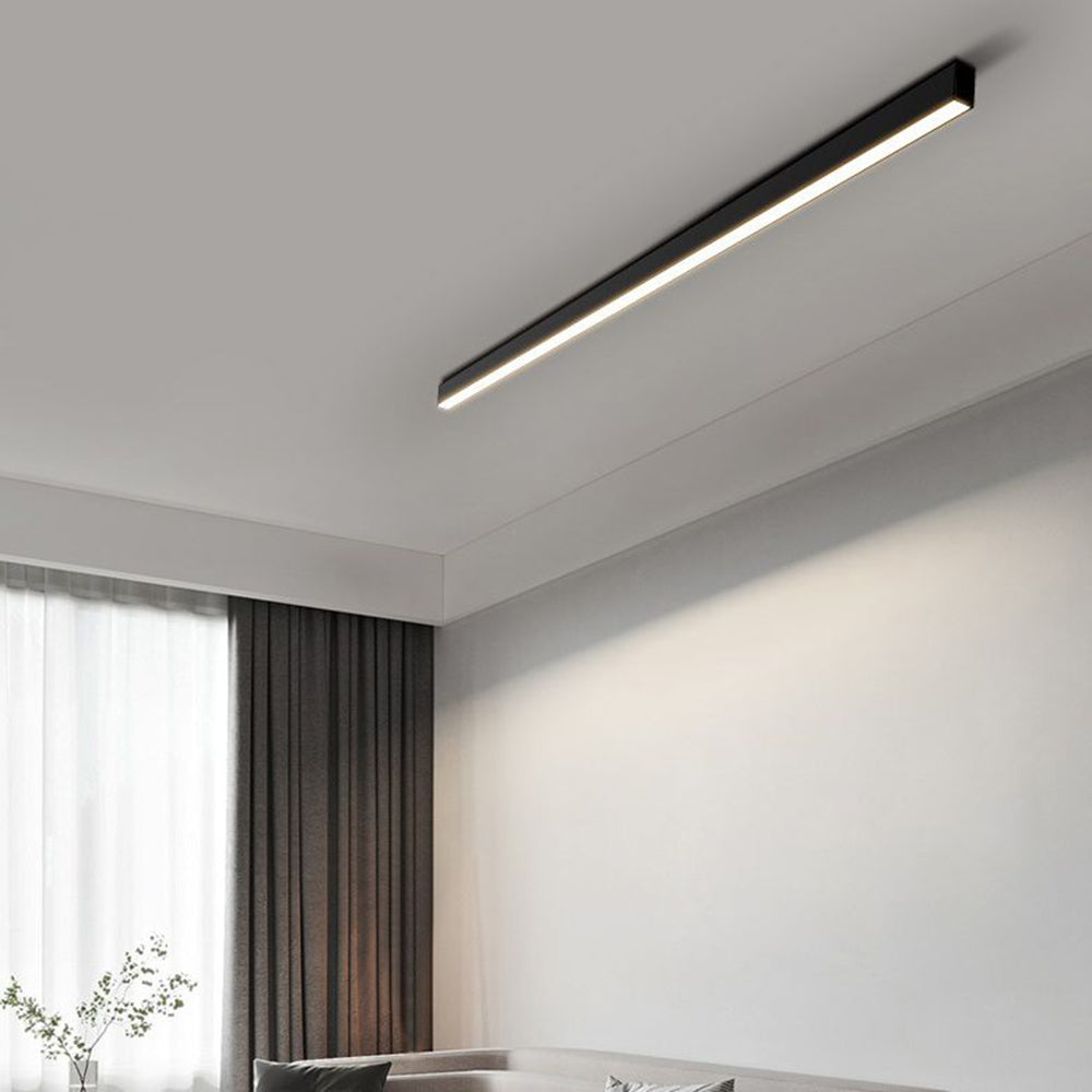 Energy-efficient black linear LED flush mount, provides bright contemporary lighting for living spaces.