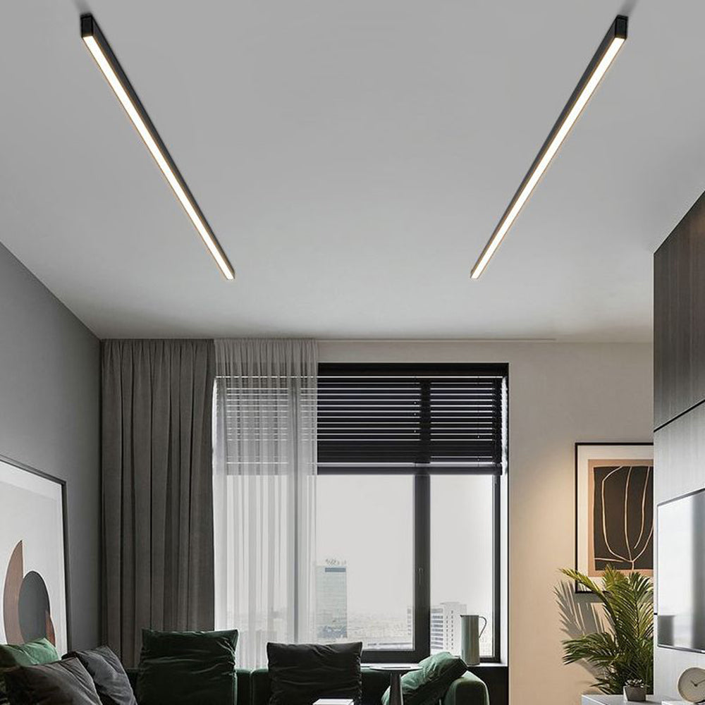 Stylish black linear LED flush mount light, dimmable and adjustable for perfect room ambiance.