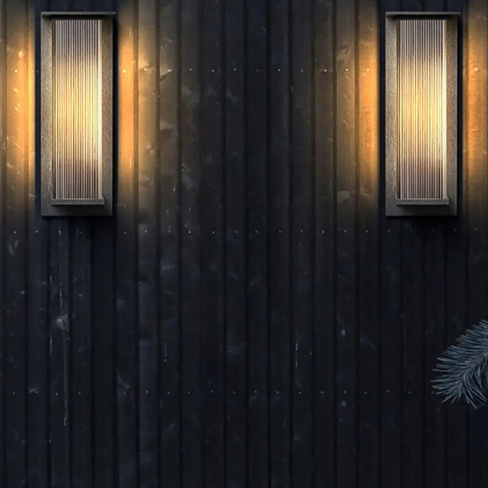 Black waterproof modern outdoor wall lamp with integrated LED for stylish garden lighting.