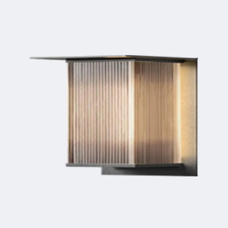 Accent outdoor lighting: Modern black waterproof LED wall lamp for contemporary exteriors.