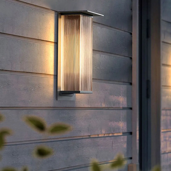 Waterproof black LED modern outdoor wall lamp, ideal for garden, patio, and home exterior.