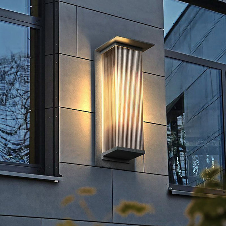 Waterproof black modern LED outdoor wall light, perfect for exterior home and garden accent.
