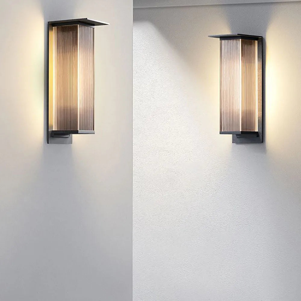 Waterproof black LED wall lamp, modern outdoor lighting for garden, patio, and accent.