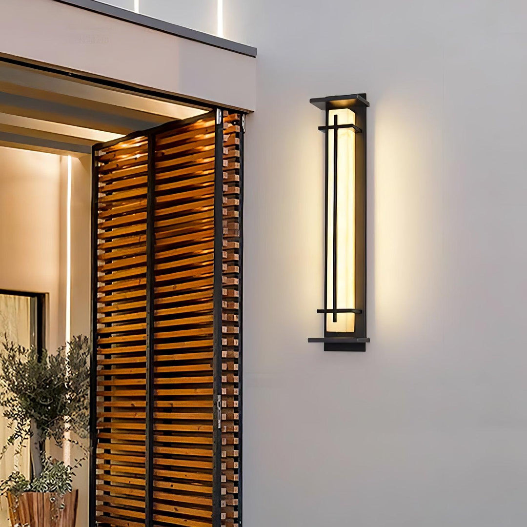 Black modern outdoor wall lamp, perfect for contemporary facade illumination.