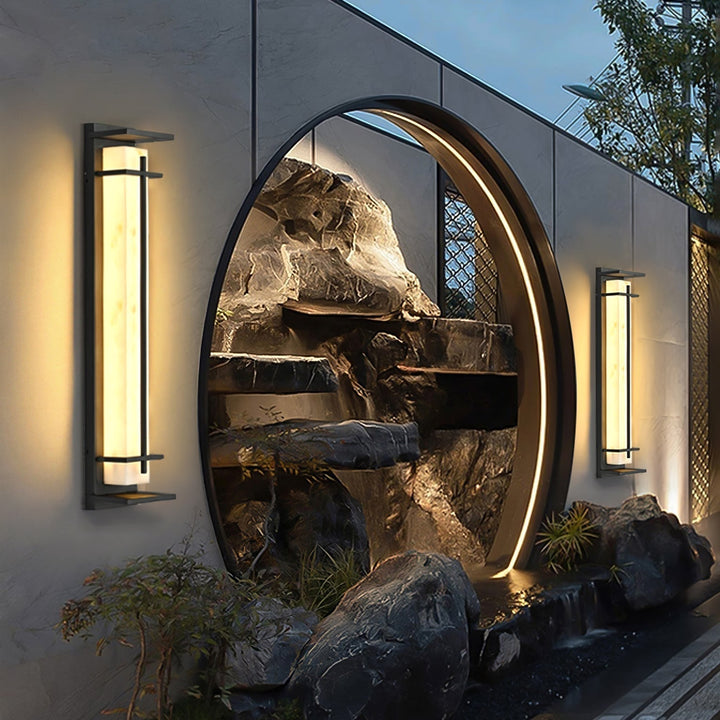 Contemporary exterior wall lamp, providing bright LED illumination for pathways.