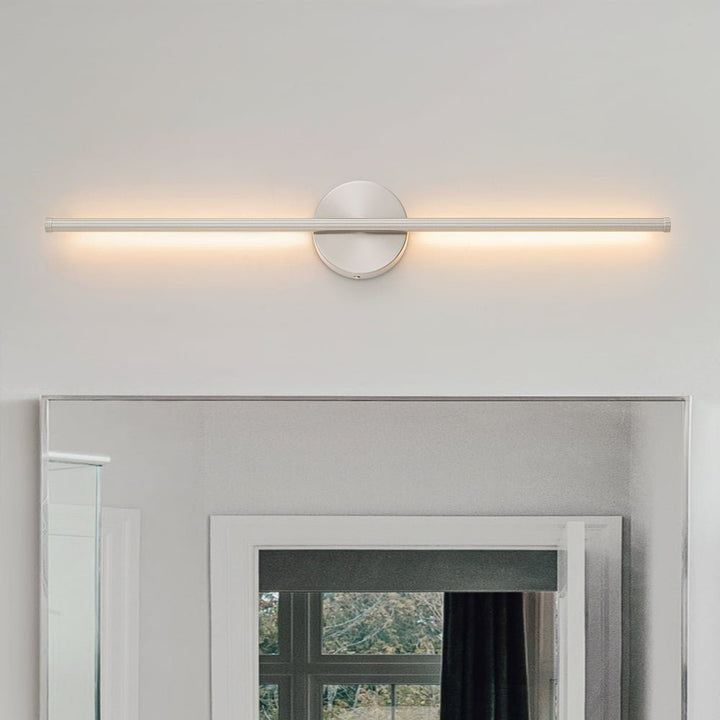 Warm white modern LED wall light in sleek black & silver, creating elegant indoor ambiance.