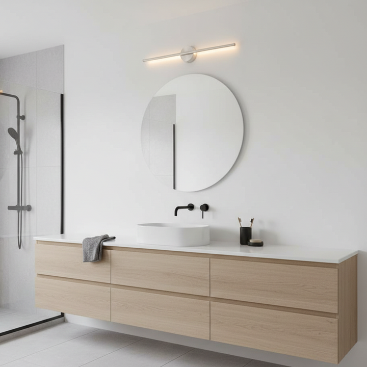 Elegant modern LED wall lamp, black & silver, a contemporary hardwired fixture for indoor spaces.
