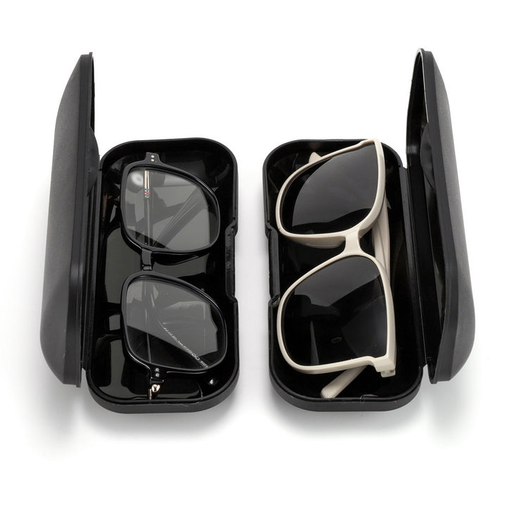 Durable black eyewear case for travel. Portable protector for glasses & sunglasses, suitable for unisex use.