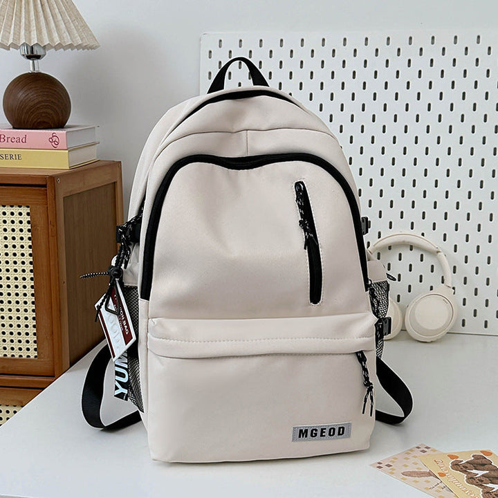 Durable unisex backpack in black, comfortably worn for everyday use, travel, and urban commute. Sleek and practical.