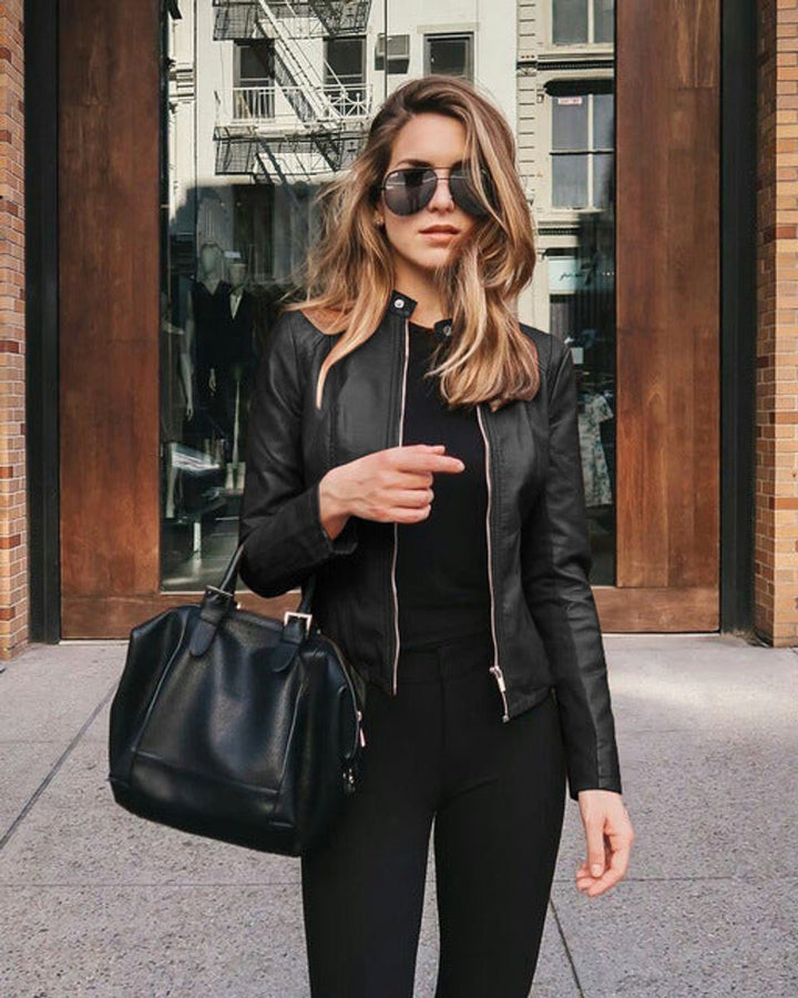 Elegant women's slim fit jacket featuring a full zip and sophisticated design, a wardrobe essential.