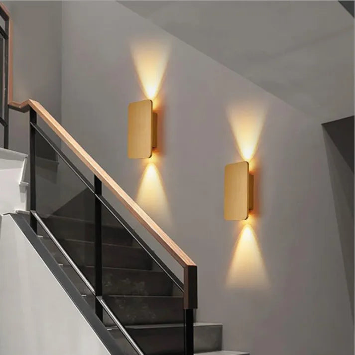 White sleek indoor LED wall lamp, a contemporary rectangular light fixture for modern homes.