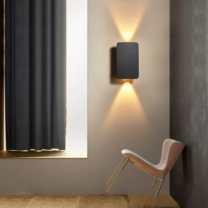 Accent lighting: Sleek indoor LED wall lamp, modern rectangular design for home decor.