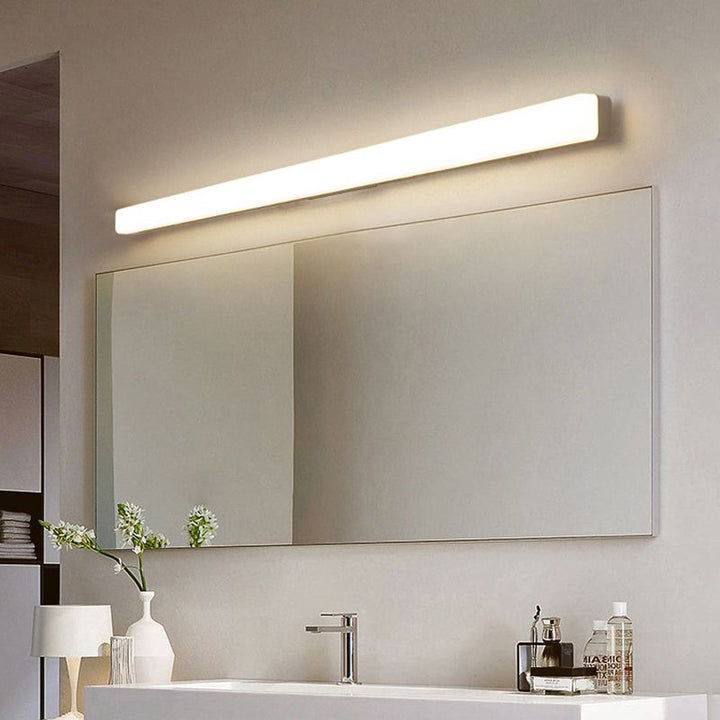 Adjustable linear LED wall light, perfect for contemporary indoor spaces.
