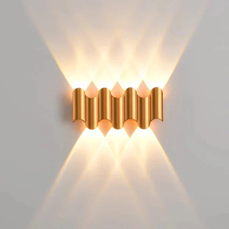 Contemporary LED wall sconce in aluminum, perfect interior lighting for living rooms, bedrooms, or hallways.