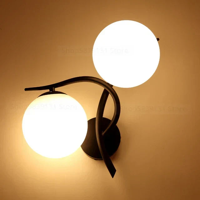 Sleek modern LED wall sconce in black, ideal for Scandinavian living room or bedroom decor, energy-efficient.