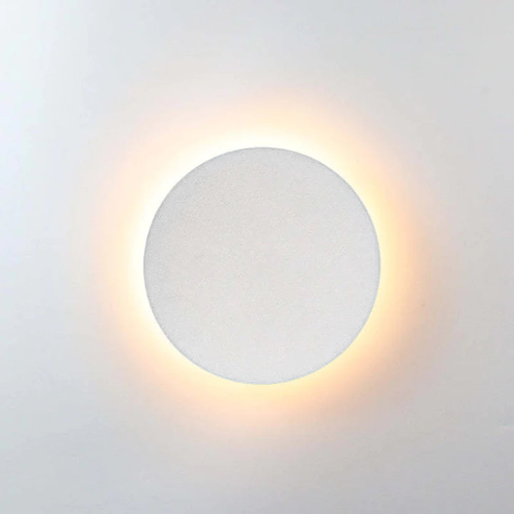 Modern LED wall lamp for outdoor use, adding a sleek touch to any exterior.