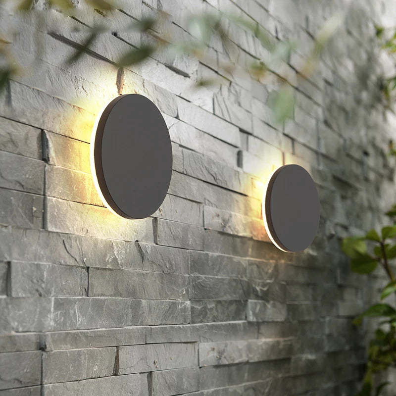 Modern exterior LED wall lamp, waterproof & dustproof for garden lighting.