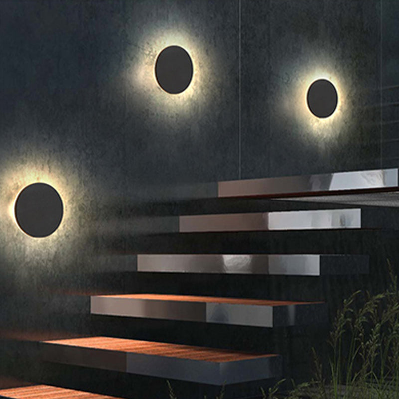 Stylish LED outdoor wall light with motion sensor for enhanced security.