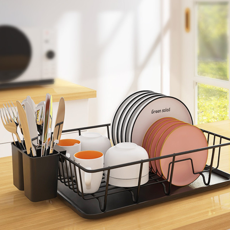 Sleek stainless steel dish drying rack with a removable drip tray for efficient kitchen countertop organization.