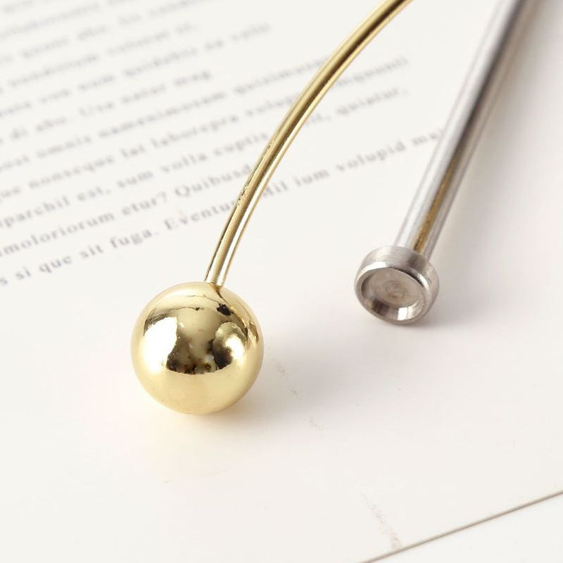 Executive stainless steel balance pendulum, a sophisticated kinetic physics toy for office decor.