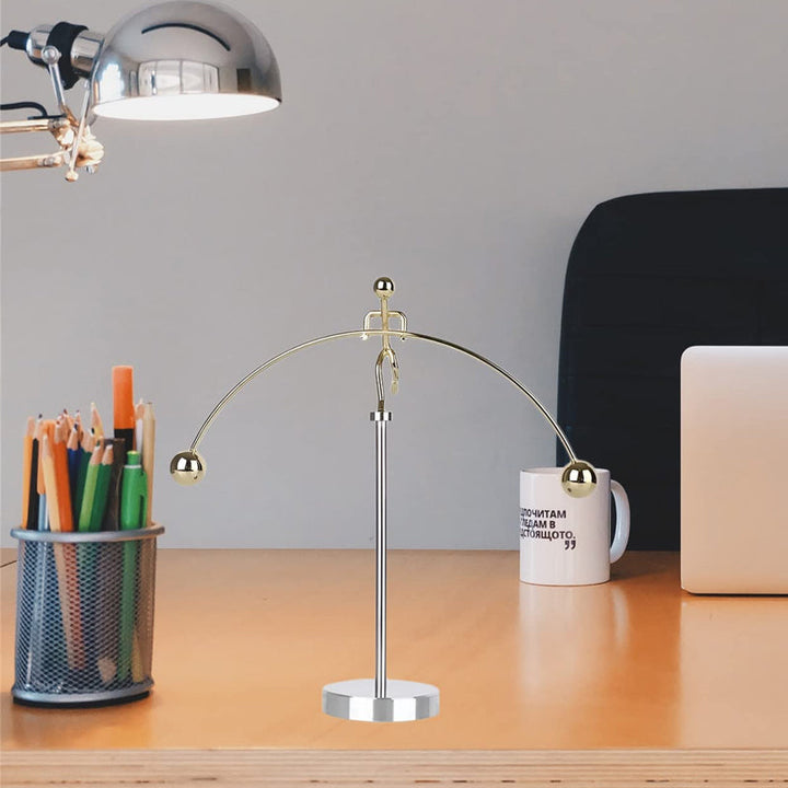 Modern stainless steel kinetic balance desk toy, perfect as a unique stress relief gift.