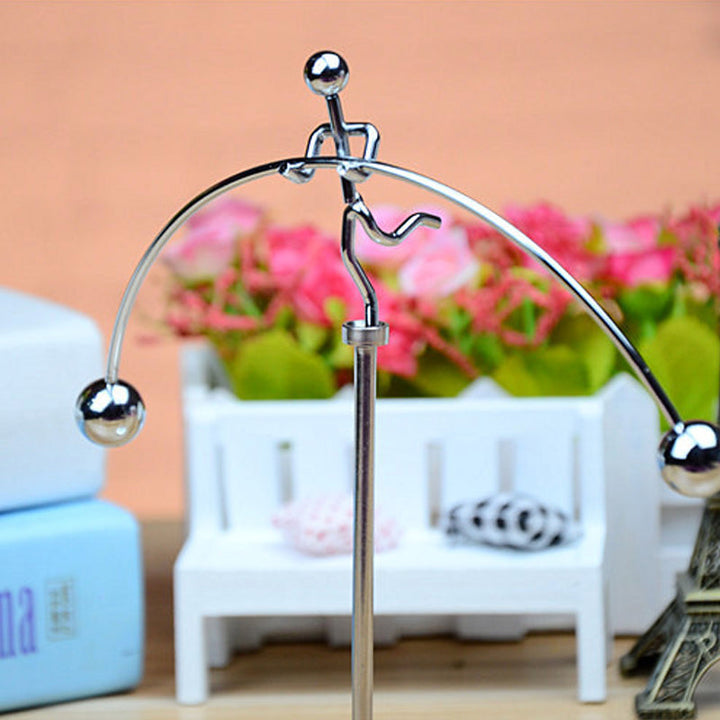 Stainless steel kinetic balance pendulum, an ideal science gift and unique executive desk toy.