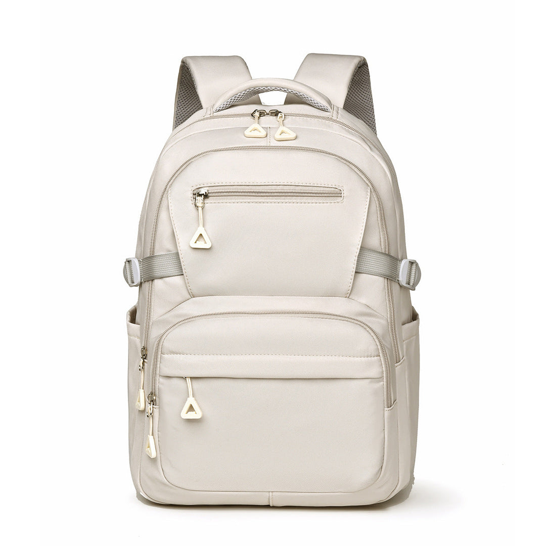Stylish unisex laptop backpack on a desk, ready for work, travel, or student use.