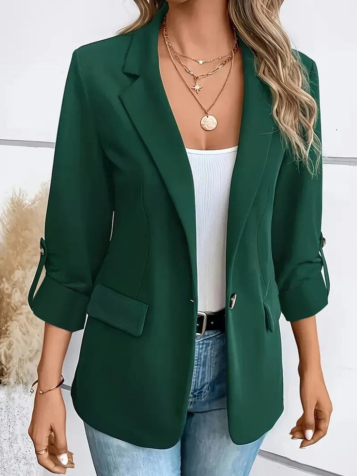 Classic women's single-breasted blazer with collar, ideal for power dressing & sophisticated office fashion.