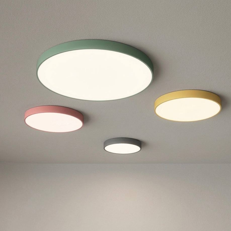 Slim LED flush mount ceiling light with dimmable options for modern indoor lighting.