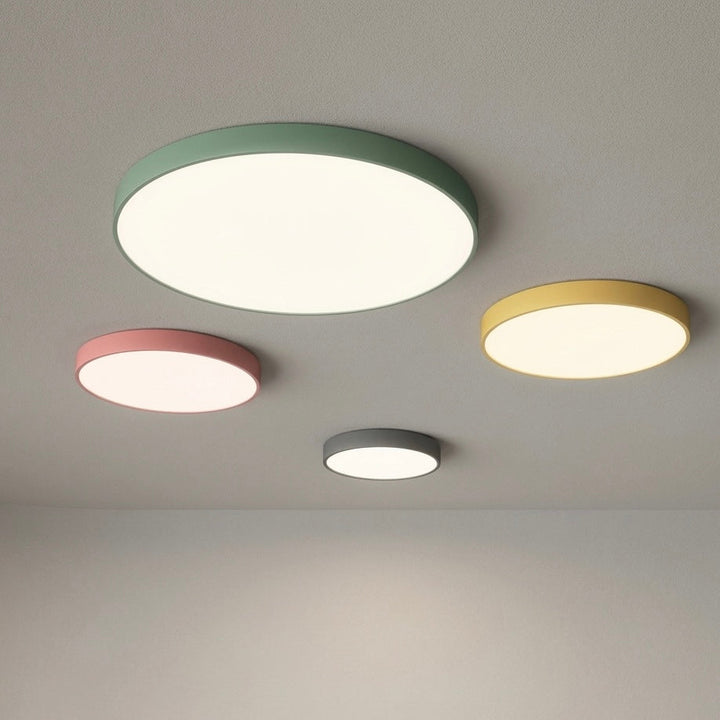 Slim LED flush mount ceiling light with dimmable options for modern indoor lighting.