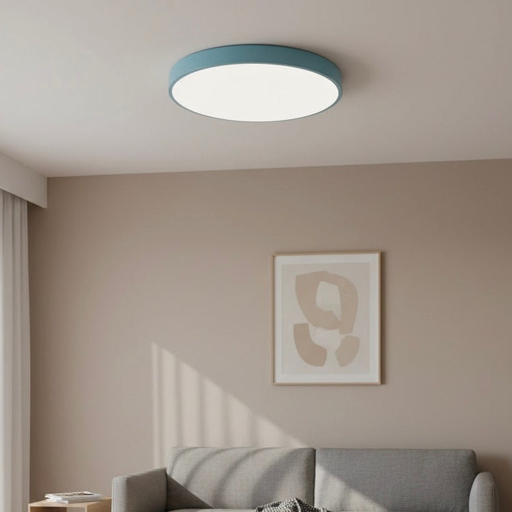 Ultra-slim round LED flush ceiling light, modern minimalist style, dimmable brightness.
