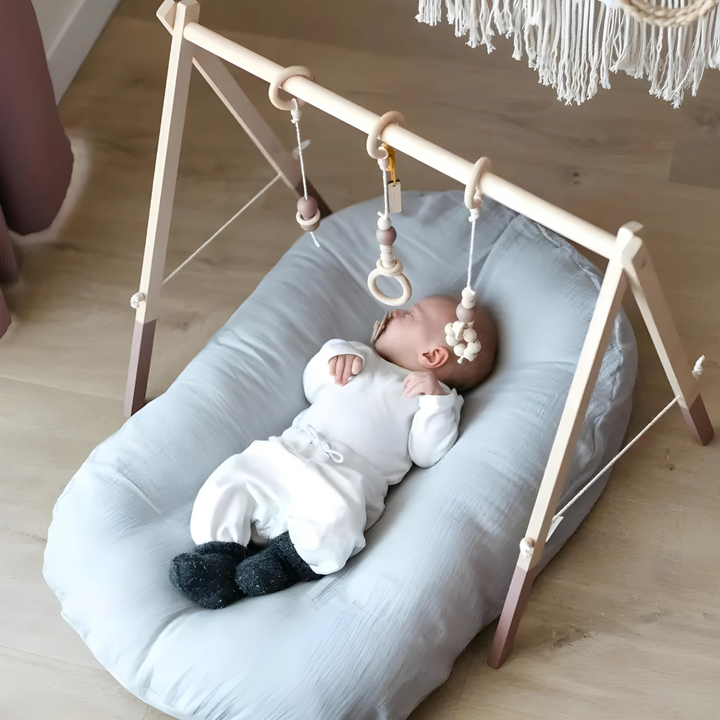 Ergonomic infant support pillow, designed for baby's head and neck comfort. Soft, breathable, and orthopedic.